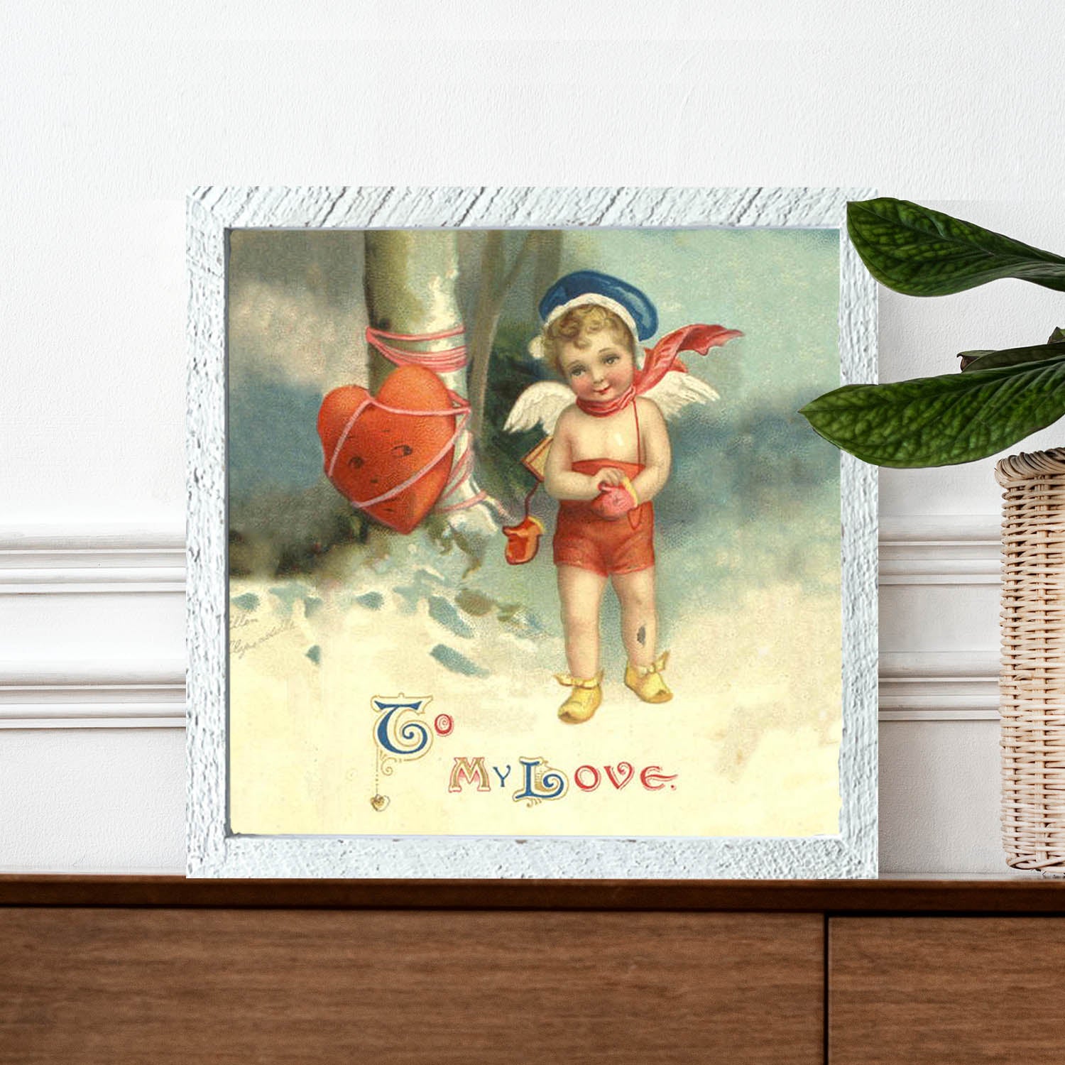 Cupid with Heart Wrapped