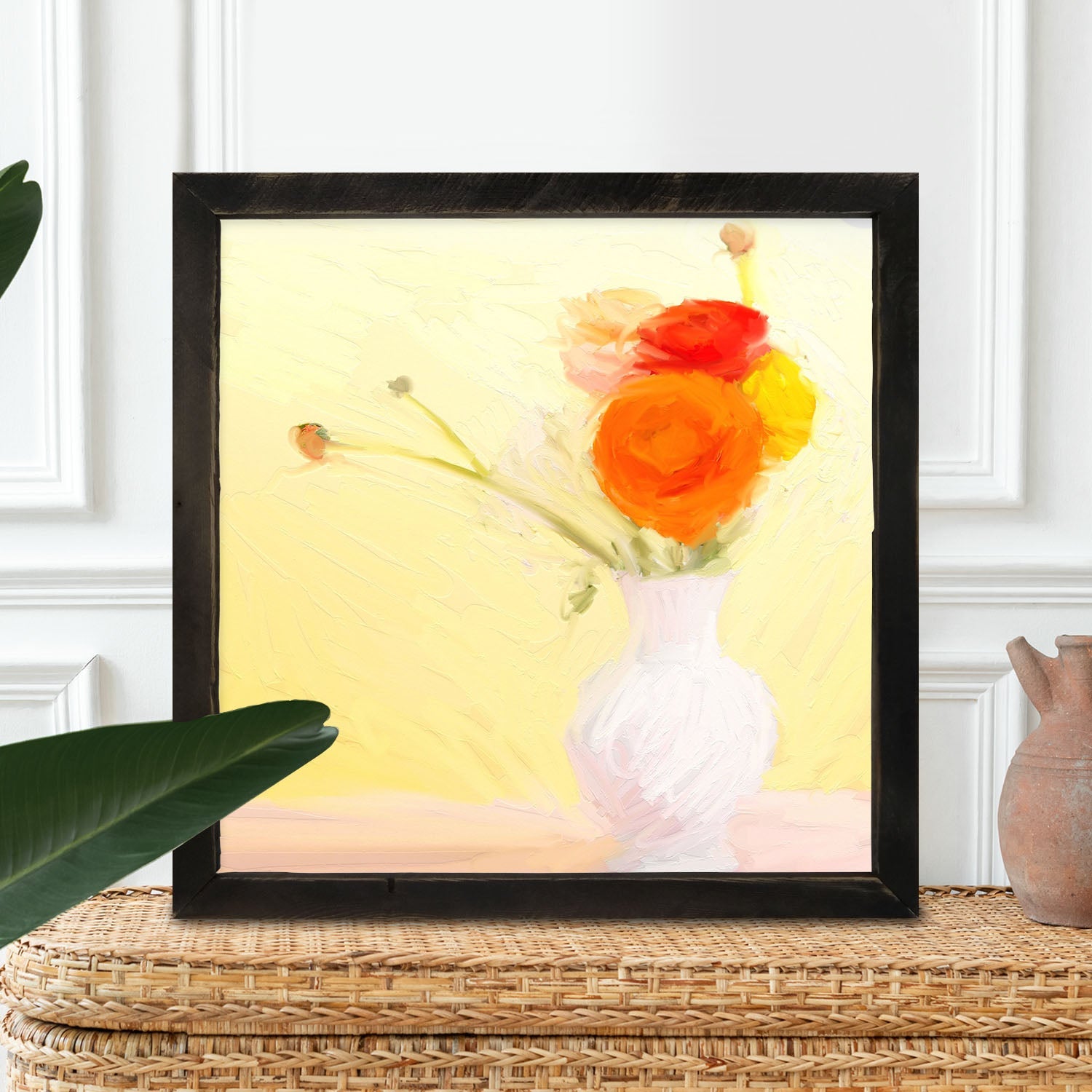 Orange Ranunculus in White Vase