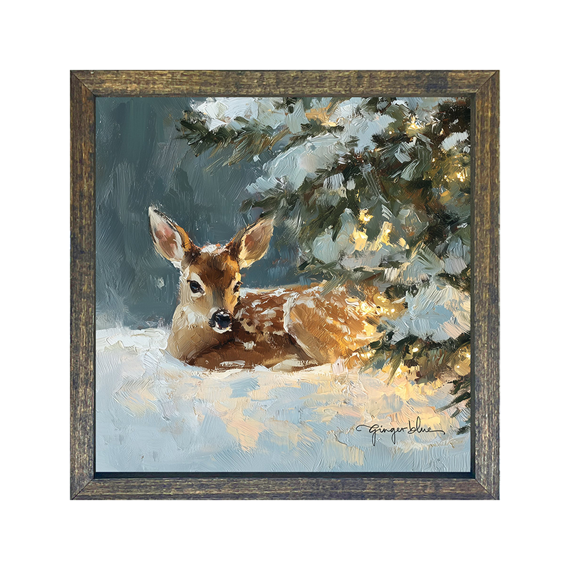 Deer resting near Pine Tree