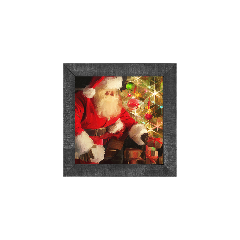 Santa by the tree