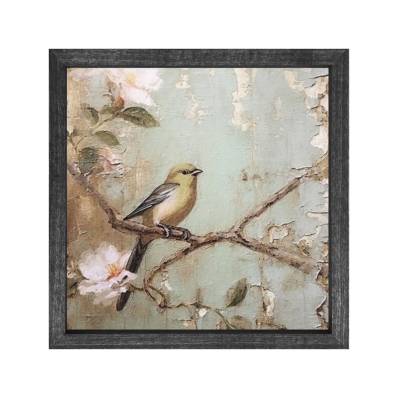 Yellow bird on branch