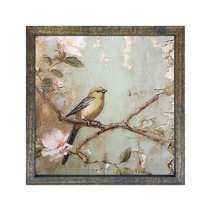Yellow bird on branch