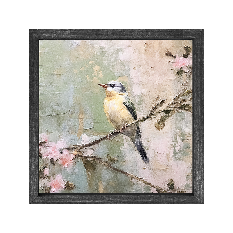 Bird sitting on cherry blossom branch