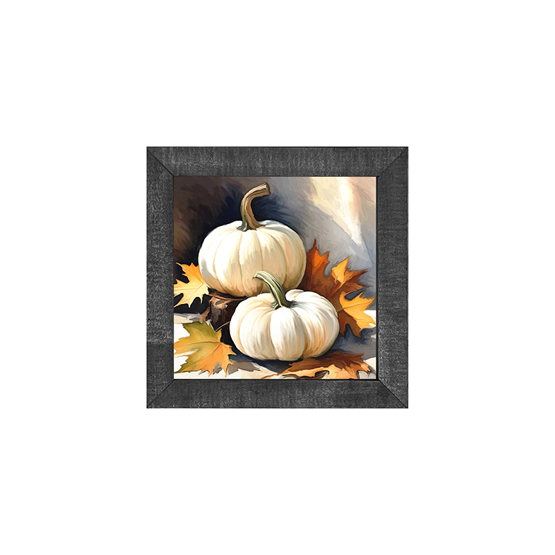 White pumpkins with fall leaves