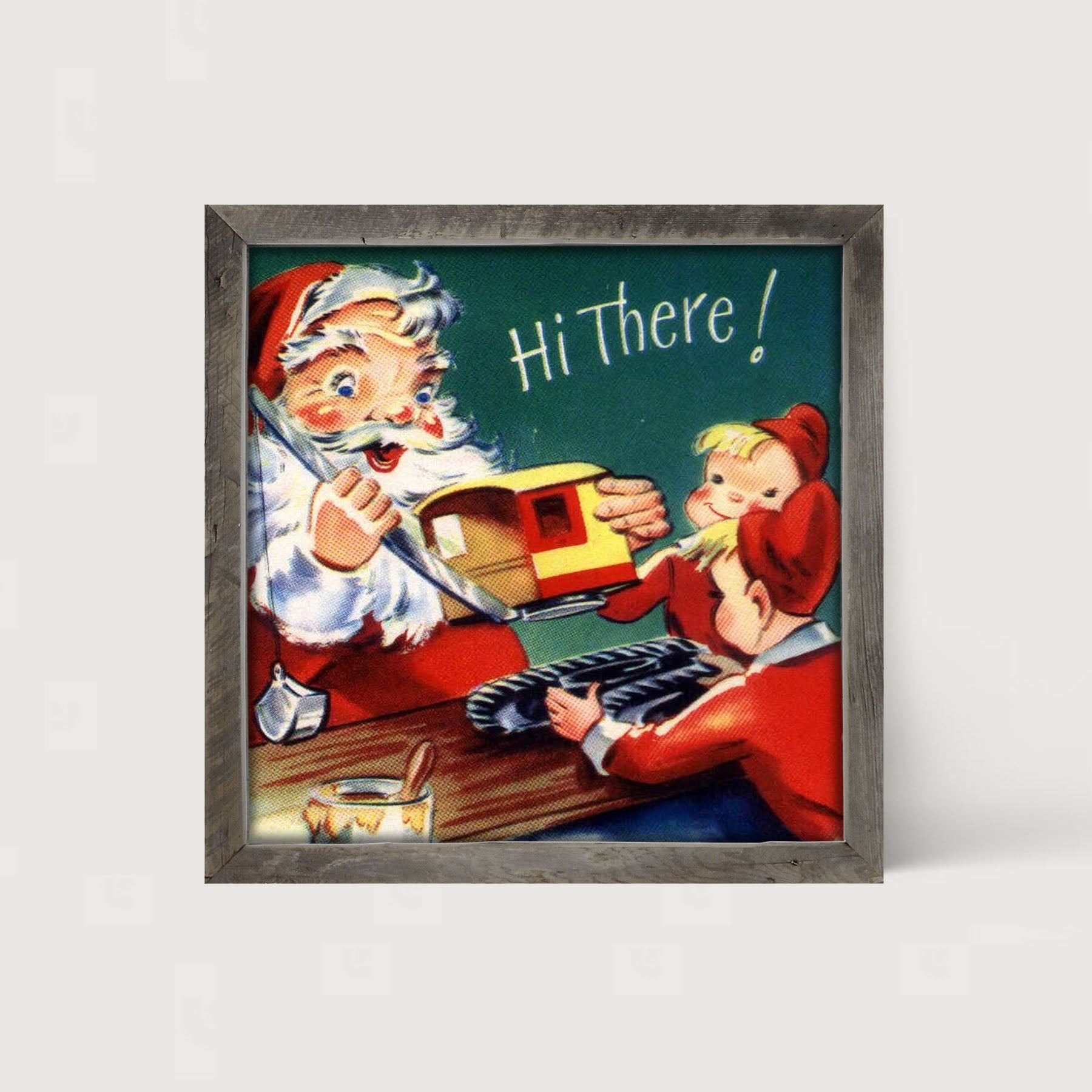 Santa with Elves Building a Train - Framed art