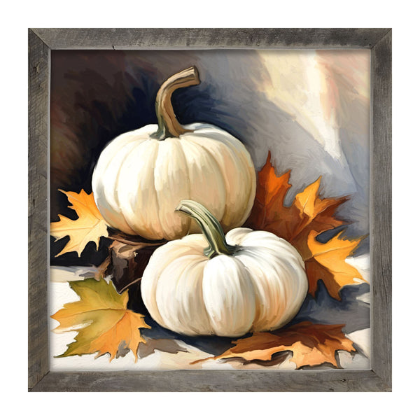 White pumpkins with fall leaves