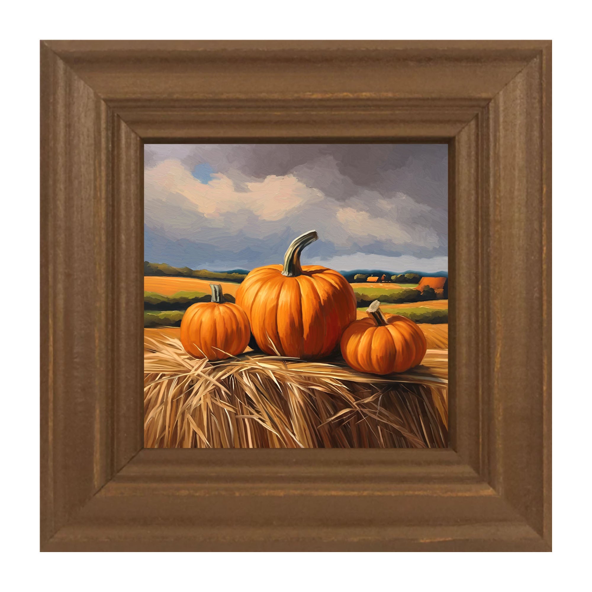 Trio of pumpkins on Hay